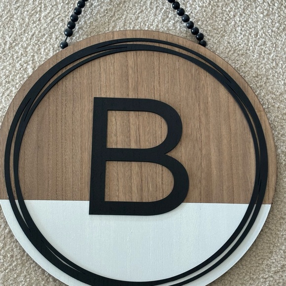 Kirklands Other - Black and Brown Monogram Round Door Decor